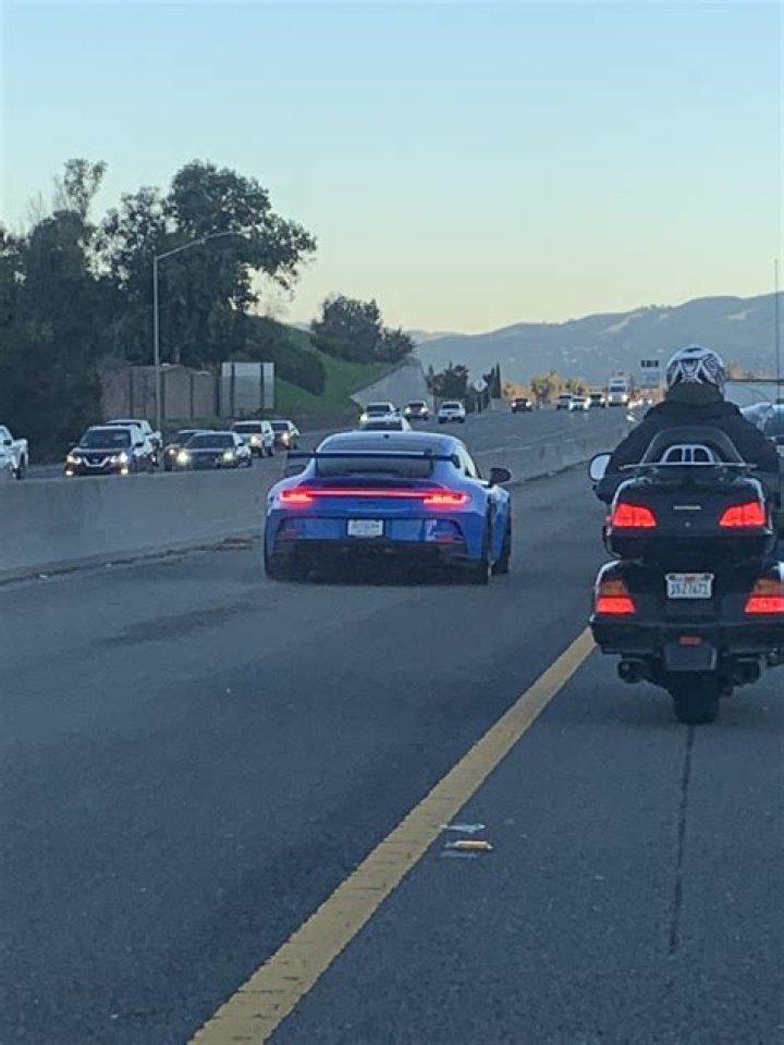 Can i drive with my flashers on?