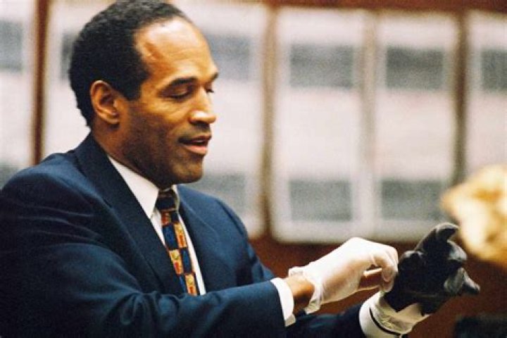 Did oj try on the gloves in court?