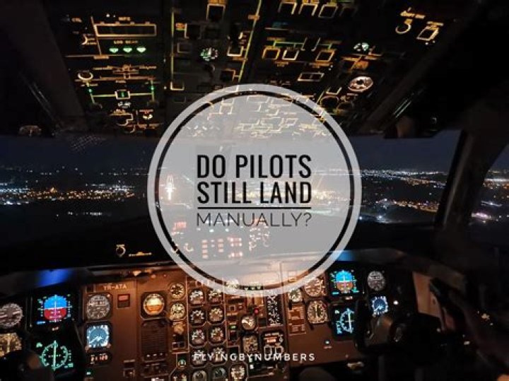 Do pilots manually land planes?