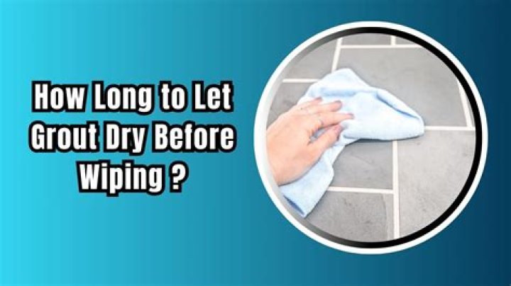 How long to leave grout before sponging?