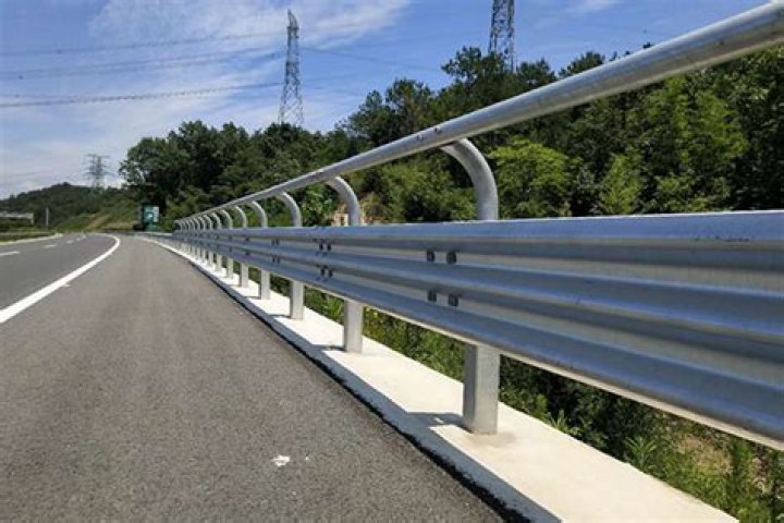 When are guardrails required on roads?