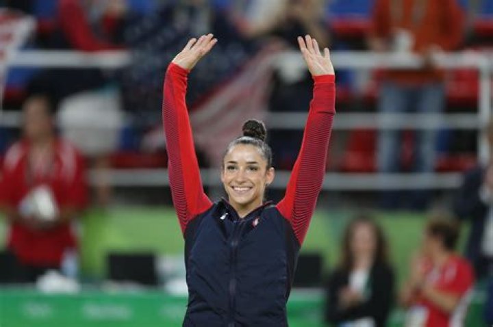 Why did aly raisman retire?