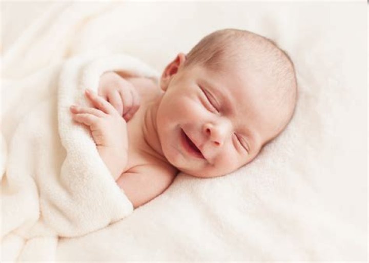 Why newborn baby smiles when they are sleep?