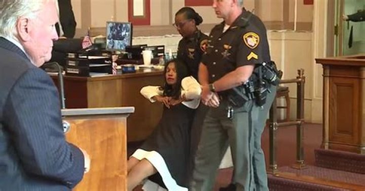 Why was ex judge dragged from courtroom?