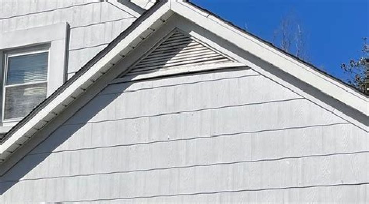 Will a bank finance a house with asbestos siding?